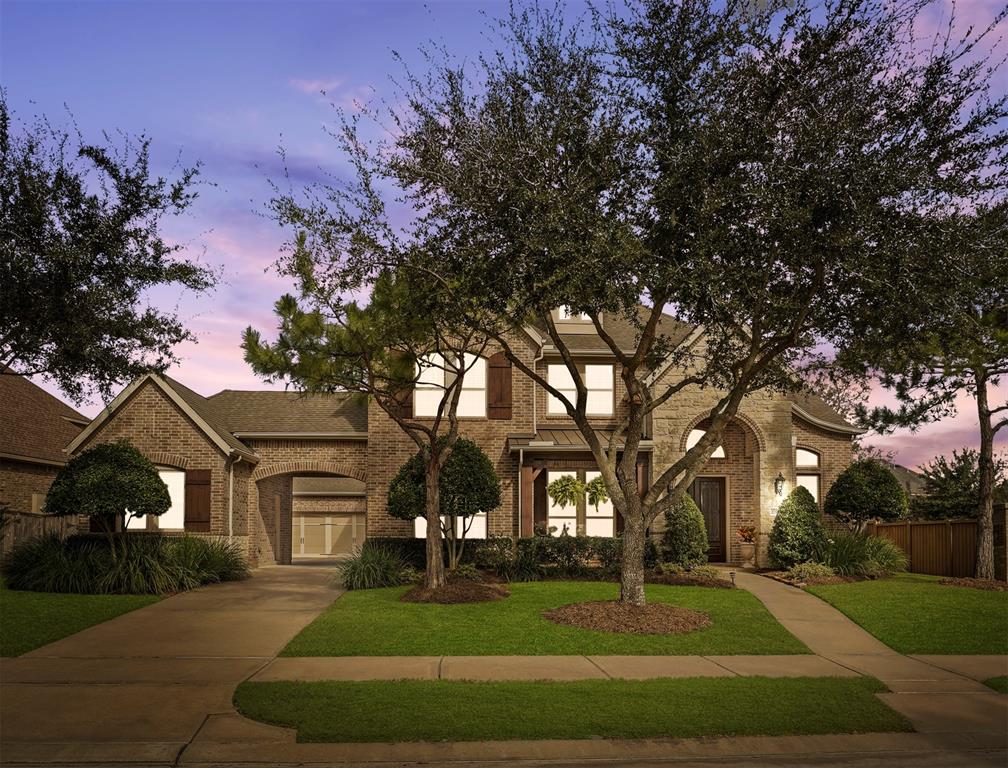 Stunning David Weekley home with a heated pool & spa on a 1/4+ acre corner on a quiet cul-de-sac street. Two bedrooms downstairs. Zoned to KISD!  High-end finishes include neutral paint, thick crown molding, raised ceilings, ceiling fans & fixtures, tile & wood floors in living areas. Gourmet island kitchen with granite countertops, tile back-splash, & a huge walk-in pantry.  1st-floor owners' retreat has a raised tray ceiling, fabulous views of the pool, great closet space & a luxurious ensuite bath with an oversized jetted tub, separate walk-in shower, dual sinks, & more. It's all fun & games upstairs with a fun game room, media room, & 3 spacious guest bedrooms. Entertain poolside with a covered patio & a built-in firepit. Enjoy the in-ground heated pool & spa with water features & custom lighting year-round. Amenities include golf, tennis, splash pad & pool, parks, playgrounds, trails, & more. Buyer to verify all information including room sizes & schools. See virtual tour!