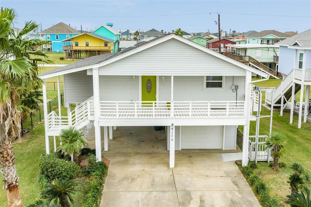 This is a one of a kind 4/2 property in Sea Isle.  This property is a total of 1952 sq. ft. and every space is usable.  The kitchen opens up to the large living area and game room/office.  The Primary bedroom has a walk in closet and large en-suite bath.  This house has it all...wrap around deck, electric storm shutters, cargo lift, extra wide driveway, stairs to the back, as well as the front deck, covered front deck, upgraded windows, and extra wide sitting area underneath the house.  One 5 minute walk to the beach or 30 second golf cart ride.  Sea Isle has a subdivision swimming pool, tennis courts with pickle ball, marina store, marina bar and grill, boat launch, children's park and the longest bay fishing pier on the Island.
