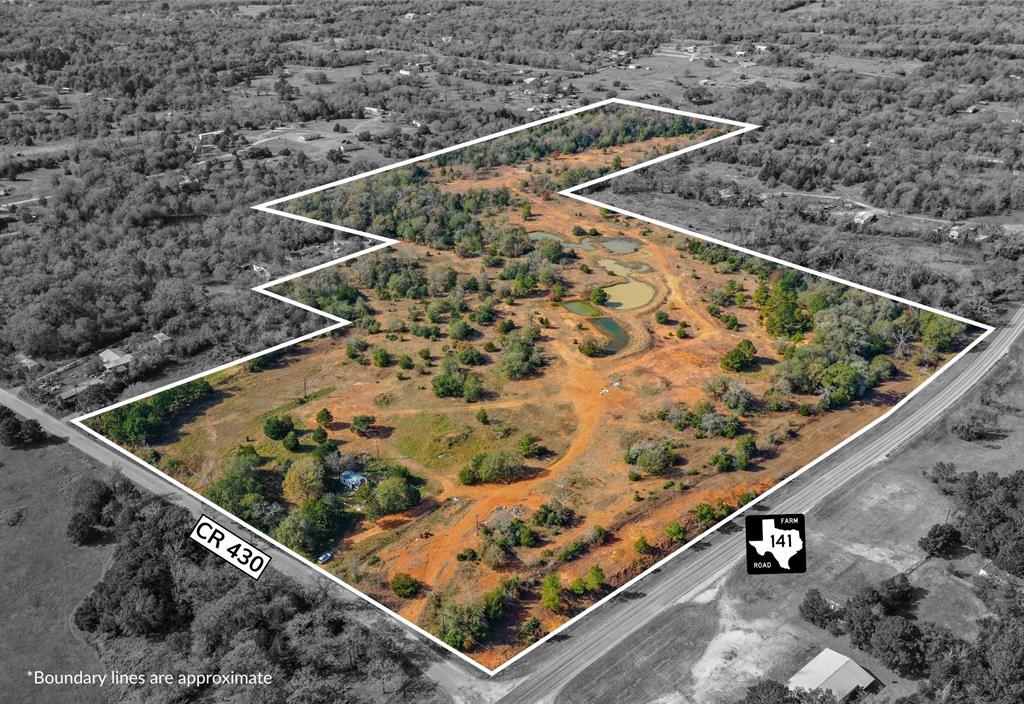 Located halfway between College Station and Austin, these 35.403 acres, with multiple large ponds, are unrestricted and Ag Exempt! The perimeter of the property is dozed, clean, and fenced with a pipe entrance off of CR 430. Electricity and water are available and there is clear land for new builds. If you're looking for an outdoor retreat, you can get away and enjoy peace, quiet, and privacy surrounded by mature pine trees. Additionally, enjoy fishing, boating, hiking, and camping only 30 minutes away at Lake Somerville.