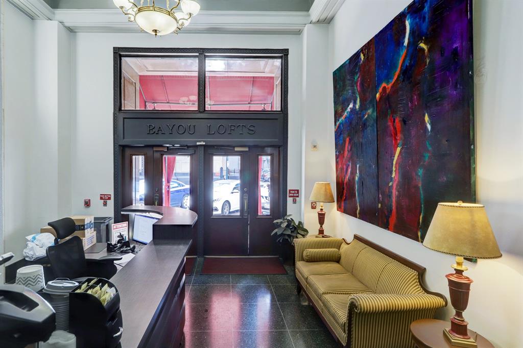 Access the front entry by key fab or 24hr concierge/security. Appreciate the high ceilings and character this special building offers with crown molding detail and vintage lighting.