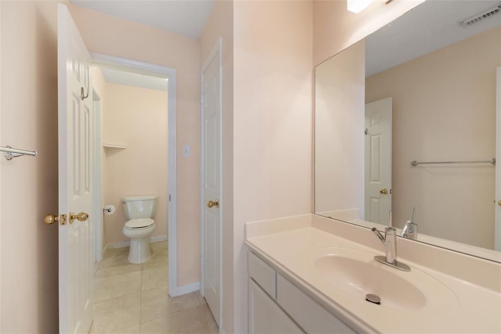 The Jack and Jill bathroom connects the two secondary bedrooms and functions well for families with kids.