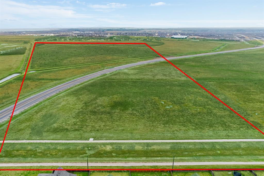 Prime property located on the newly developed FM1409. This 44 acres is ready for residential or commercial development. 28.26 acres is located on the west side and 16.5 acres on the east side of FM1409. Great for a retail strip center, anchor store, or housing! Just minutes from I-10 and Eagle Dr! Nearby homes, entertainment, and shopping in the growing City of Mont Belvieu. Located in Barber's Hill ISD