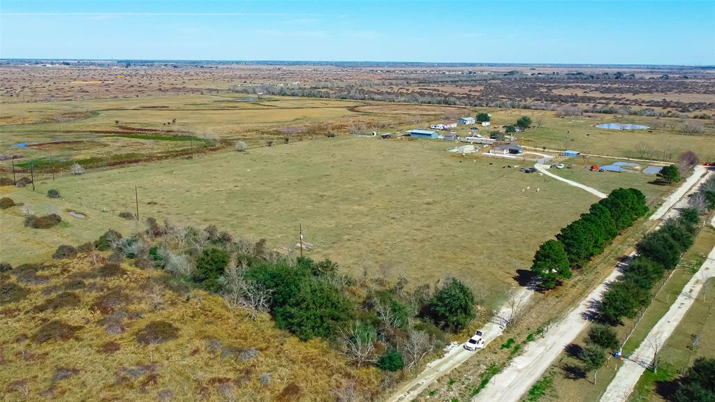 Located in Hockley Tx, this is a 12 acre tract with a nice mobile home with plenty of room to build a barn, while enjoying country living. Featuring three spacious bedrooms and two full bathrooms. The lot is mainly cleared and has great homesite potential. Agricultural exempt is available. The sky is the limit with this piece of property!