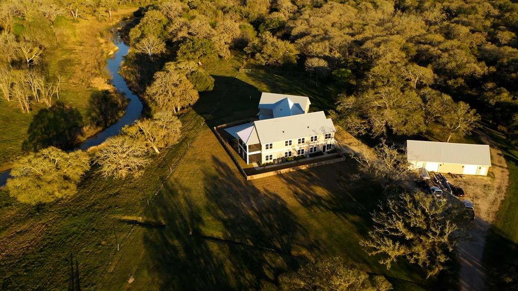 1138.4 Acre Estate in Matagorda County, just 1 hour southwest of Houston.  Covered in Live Oaks, this is a recreational Rancher's paradise; A haven for Deer, hog and ducks.  Live Oak Creek crosses the ranch for the bass angler and only 20 minutes away from Matagorda Bay for the finest saltwater fishing on the Texas Coast!  This property is complete with an Estate home / Lodge for entertaining employment or corporate retreat.  This is a once in a lifetime opportunity!  Owner will consider high fencing and leasing to a corporation.
