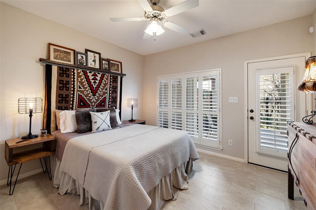 This guest bedroom is located on the ground floor and directly off the back patio space.