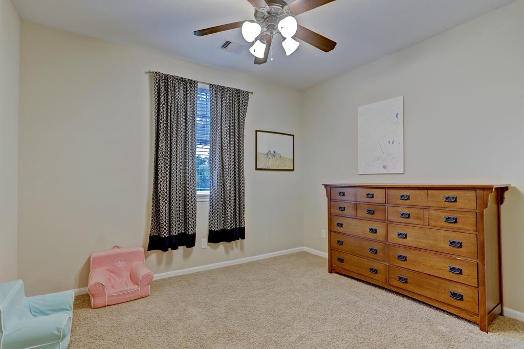 Charming bedroom #4 with upgraded ceiling fan and light kit.