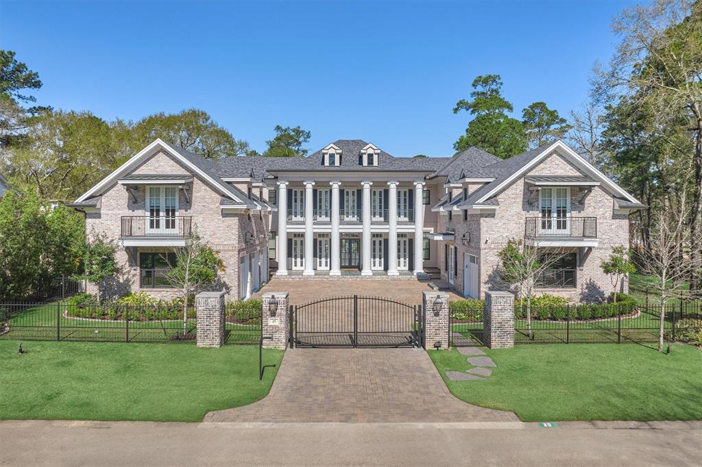 Custom luxurious Colonial Doe Run Estate located on the 12th hole of The Woodlands Country Club East Course. Elegant & traditional finishes welcomes you w/expansive Porches, Bevolo Gas Lanterns, Cantilever Balconies view Motor Court & Grounds, Indoor/Outdoor Living, Visual Comfort Lighting, custom Iron Staircase, Millwork, Brick accent Walls, Hickory Flooring & Carrera marble. The Great Room offers abundant natural light & opens to Chef’s Kitchen, Thermador appliances, 2 dishwashers, Wine Fridge, Steam Oven, Catering Pantry & large Marble Island. Primary Suite w/Sitting Area, Spa Bath, Fireplace & Veranda w/Fireplace. 2nd Floor has Game Room/Media/Wet Bar, 3 En-Suite Bedrooms,  Entertaining backyard w/outdoor Kitchen, Pool/Spa w/fire accents, Pool Bath w/Shower, Basketball/Sport Court, Firepit, Summer House, Exercise Room w/Full Bath/Steam Shower. Separate 2 story Office/Guest Suite/Gentleman’s Parlor w/private Entry. 4 car Garage, 2 Generators, Elevator, & Control 4 Home Automation.
