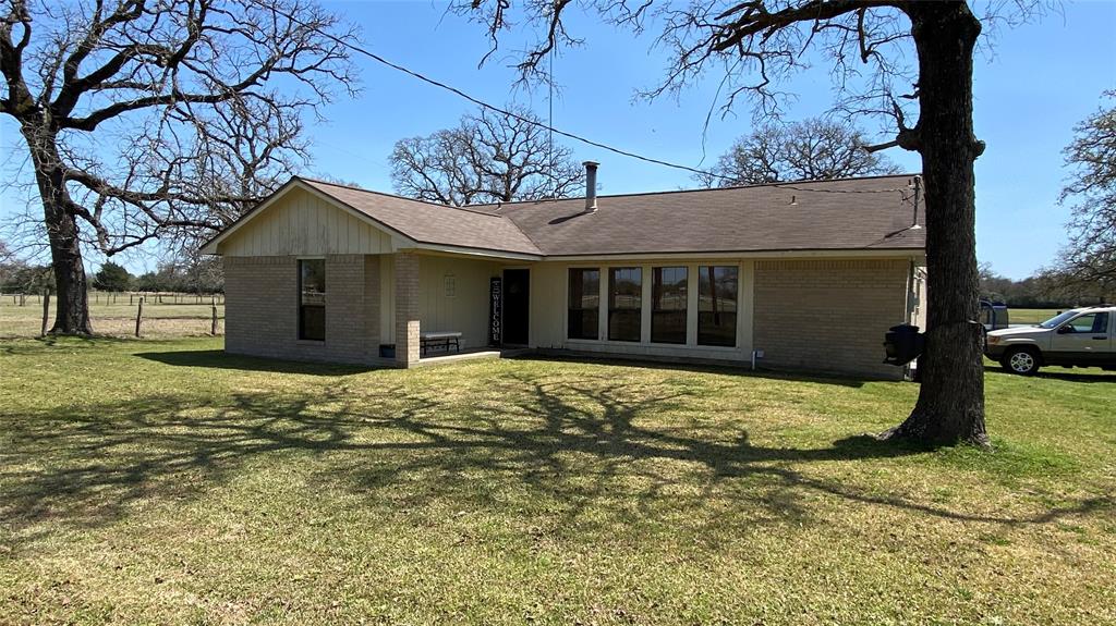 Looking for a property ready to move into? Want Highway Frontage? Need to be closer to Bryan/College Station? This is your property. This is a beautiful 3br 2ba brick home. Approx. 7 +/- acres out of a bigger track of land. Den, breakfast, kitchen, utility room, vinyl, tile and laminate flooring, fenced on 3 sides, stock tank, Hwy 21 frontage.