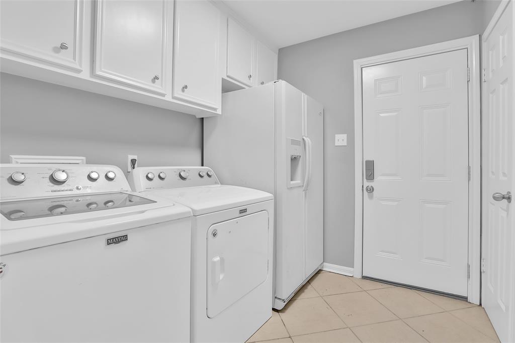 Laundry room conveniently located in the house.