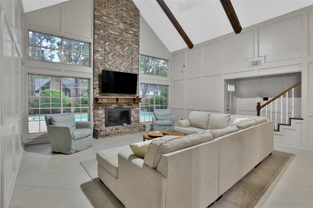 Relax in your living room overlooking the pool.