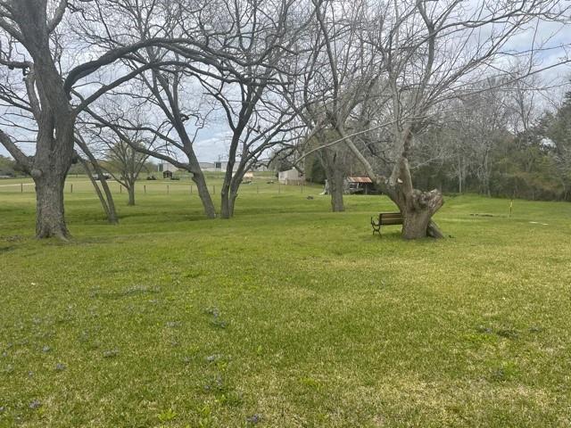 Beautiful unrestricted small acreage property off Old Mill Creek Road.  With it's gorgeous pecan trees and beautiful country views this 1.6 acre property is the perfect place to call home.  Property is already established with well, septic, electric and driveway.  There is currently a mobile home on the property that is being sold "As Is"