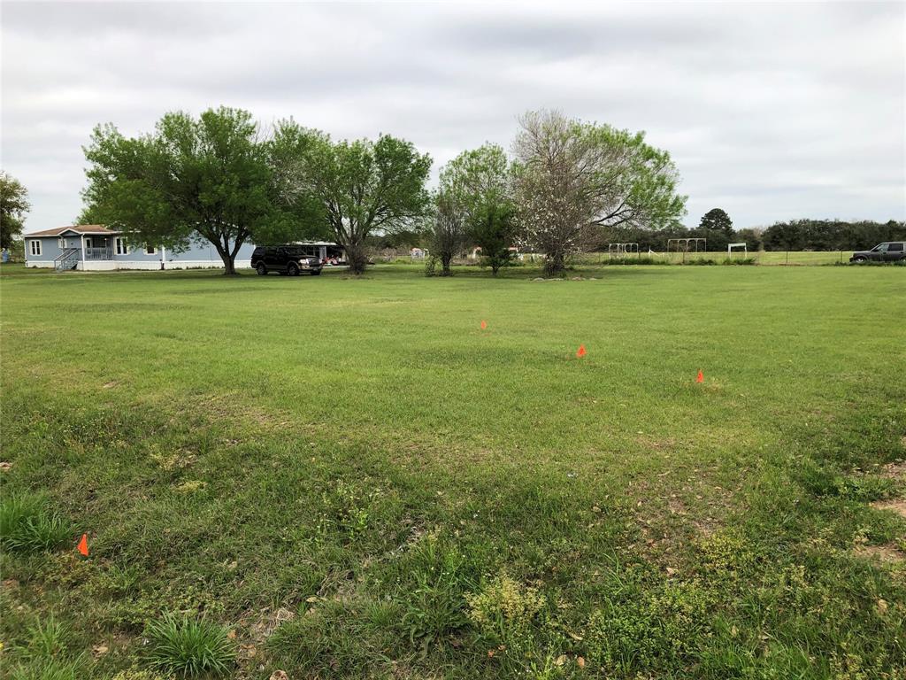 The land is 10.419 acres and is unrestricted with a Ag Exemption on 9.4190 acres. Has a manufactured home that goes with property, that goes as is and is in good condition. Home can only be shown when buyer is considering making a offer. Owner would like at least a 48 hour notice to see home. For just wanting to look at property please give 2 hour notice. The roof is approx. 6.5 years old , and the windows are double pane storm windows. 
        This is a wonderful piece of property and is not in a flood plain. It is ready for you to come and build your beautiful home, and have horses, cows or chickens. You can also have a business of your own as there are no restrictions on this property. Sold as is. Property is close to 290, fm2920 and 99. Very close to several shopping areas.