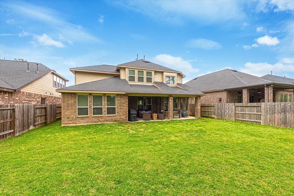 1075 Ginger Glade Lane, Pinehurst, TX 77362