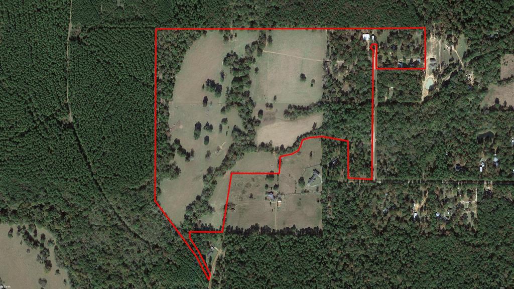 106 acres  of pastures and woods just west of Coldspring in San Jacinto county.  One story ranch home, 2040 sf built in 2006, offers open floor plan, 3 bed, 2 bath, concrete floors, stainless steel kitchen counter tops, wood burning stove, long front porch.  Stone and cedar exterior with metal roof; 2 car carport attached.  2 equipment covers,  large hay storage building, working pens, shop building. Five large pastures,  watered by Sand Creek and Ross Branch, fenced and cross-fenced for livestock management, two ponds. This one is a must-see!