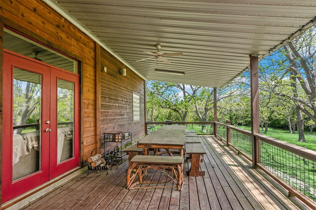 They say ranch life is the best life! Come experience it yourself on this sprawling 86 acre property.  Some features of this ranch property according to the seller are: Entirely fenced, 20 acre hay field, three residences, fishing pond with deck and shelter, 400' ft water well, large septic system, Pecan Grove 50+ trees, large RV with shelter, automatic gated entrance, 43x80 barn with two 20' wings, windmill with 90' well, creek crossing in place, garden with chicken coop, 15+ citrus (oranges) trees, and hunting area at the back of the property.  Two of the three residences are on the first floor and one is located up a spiral staircase on the 2nd floor and would also serve as an excellent game room.  Schedule your showing today with your favorite real estate agent!