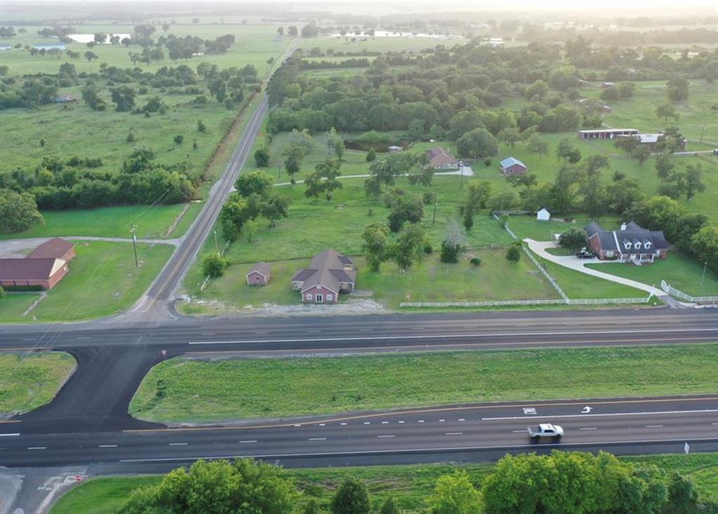 Great 2.9 Acres of commercial property on the corner of Hwy 6 and FM 1227 with frontage on both Hwy 6 and FM 1227. Fantastic location for Restaurant, RV parks, or anything you want to develop. This listing is for both properties (A0059 J Wallace, Tract 10-3, Acres 1.86 and A0059 J Wallace, Tract 10-4, Acres 1.079). There is a vacant building on the property.