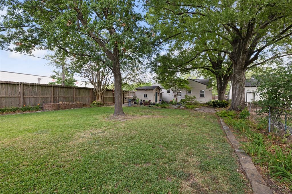 This is another shot of the backyard. There is no structure immediately west of this property, which could offer some great natural light if you are looking to build new.