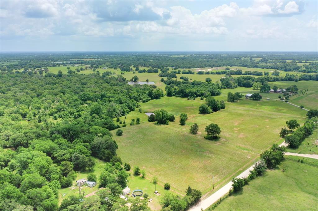 Don’t miss out on this beautiful 15.9719 acres in North Zulch located in Madison County. This land is cleared at the front of the property, large trees throughout the property, and has two small ponds. This is the perfect setup to build your family home in the country! The property includes a nice amount of road frontage to CR 435. Approximately 25 minutes from Madisonville and 40 minutes from College Station. This is a beautiful piece of property that is hard to find, ready for your family and animals! Give us a call to schedule your showing!