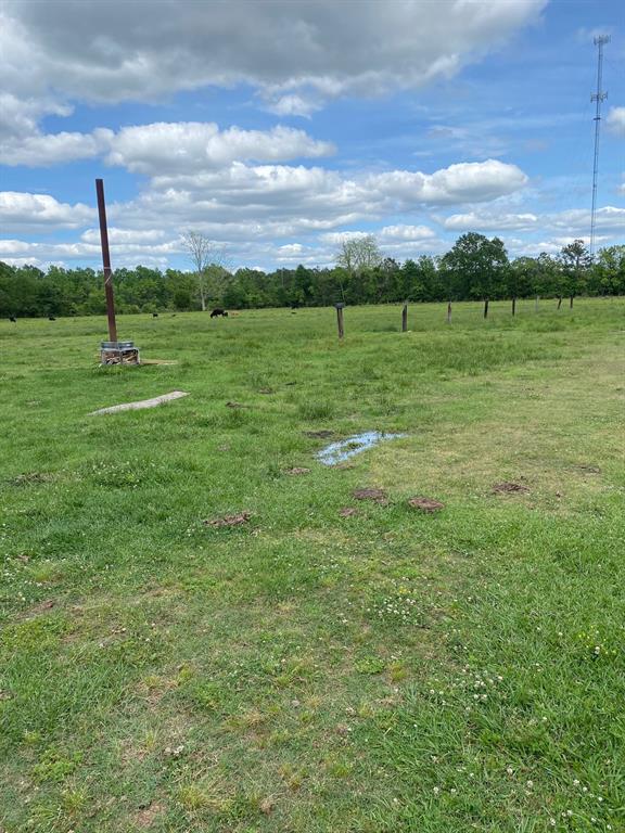 Nearly 40 acres, this corner property is conveniently located right off of US-90 with access through county road 154. Upon completion, the grand parkway will be under 15 miles away. This property has a huge covered concrete slab and a studio room with a full bathroom. A half bathroom is located outside of the studio room. All utilities are available. A tax agricultural exemption is in place.