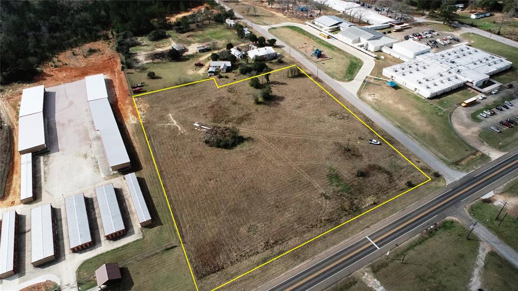 This 4.710-acre tract is located near the heart of Coldspring and 10 minutes from Lake Livingston. With State HWY access, high visibility, and traffic counts, this tract offers a multitude of possibilities. Perfect for commercial, residential, or senior living development use. This fantastic property is unrestricted, high and dry, and located outside the city limits to build your dream home, mini-homes for rent, or a storage unit business. Access to power and city water is available. Do not miss out on this gem. Book your appointment today!
