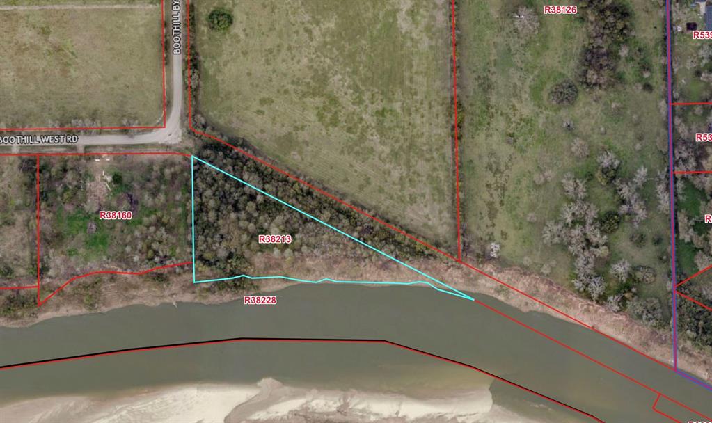 Paranoiac water views. Two acre riverfront lot with over 500 ft Brazos River frontage. Just off FM-1093. Very low tax rate.