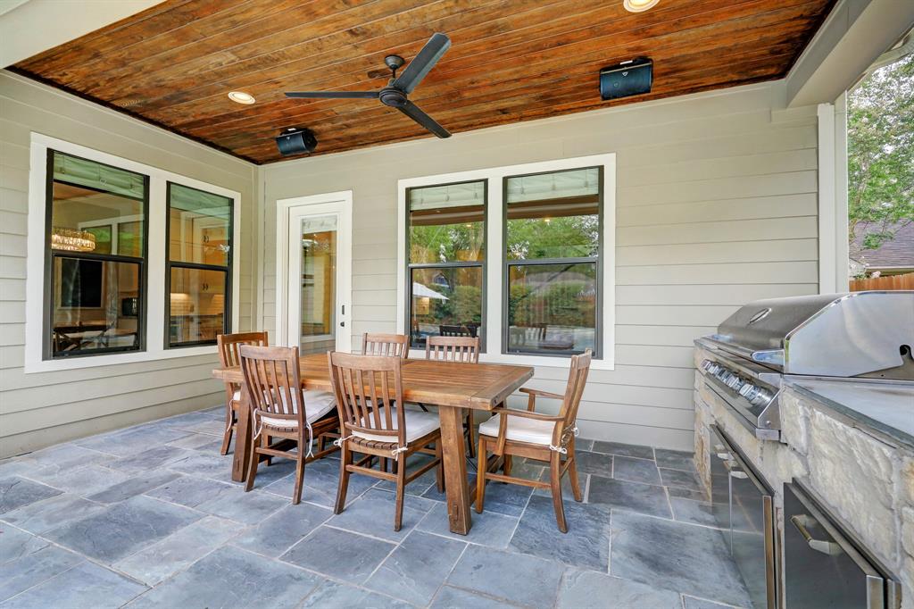 For most of the year the covered deck area is a direct extension of the interior living space, including a built-in grill and cooler.