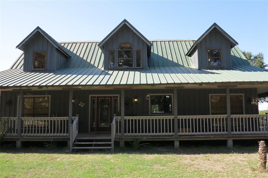 128+ Acres of Country Living. Outdoorsman's Dream, come hunt, hike, ride horses or get those ATV's out and make your own path.  40 to 60 acres wooded,  2 ponds, creek and  Hay pastures.  This property is fenced and cross fenced for horses or cattle. 2 story Farm House style home with wraparound porches with 2 Primary Suites on the ground floor. Beautiful wood work throughout the home. The kitchen is fabulous with custom cabinets with drawer slides, lazy susan in all corners, pantry slides and large drawers for pots and pans.  
                        COUNTRY: PURE AND SIMPLE -  A PLACE TO HANG YOUR HEART!