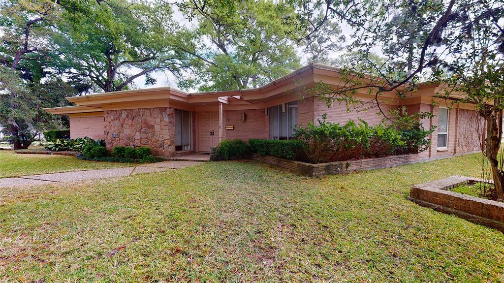 Great opportunity to make your home in Briargrove Park, with shopping and restaurants only minutes away. Easy access to Beltway 8, I-10, and Westpark Tollway. This lovely mid-century modern home has Miami Stone brick and volcanic stone exterior, the family room has a beautiful, vaulted ceiling and large fireplace with volcanic stone surround. The home has 4 bedrooms, 2 ½ baths, formal living room with second fireplace, formal dining room, separate breakfast room, wet bar, storage and closets galore, and walls of windows overlooking a sparkling pool and spacious covered patio. Great bones in this original construction to make your own!