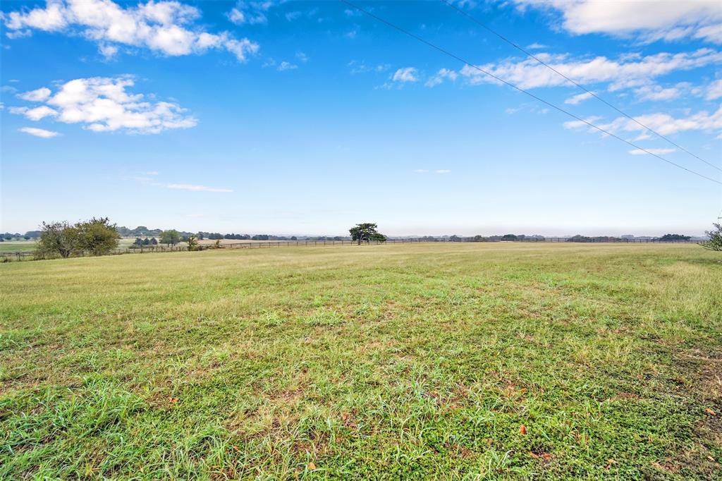 Beautiful 12.633 unrestricted acres.  This property has one of prettiest views in the Brenham. Elevation is around 450Ft. Rolling hills and wide open pristine views. Asphalt road on two sides of property! This is a must see property!  Make your appt to view today!
agent related to seller