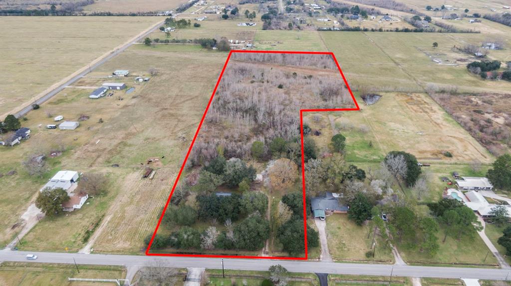 Looking for Land? GREAT INVESTOR POTENTIAL on this 12 acres on Barbers Hill Rd. House is not livable but can be remodeled or torn down. Beautiful, mature trees! Property is currently being sold for land value. ENTER HOUSE AND AND ANY BUILDINGS AT YOUR OWN RISK. SELLER IS NOT LIABLE FOR ANY ACCIDENTS OR INJURIES. Seller's Disclosure and Survey can be accessed by your agent.