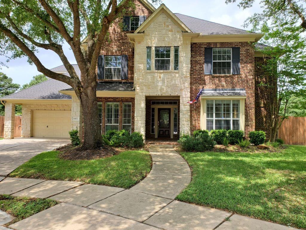 MUST SEE THIS CAPTIVATING BEAUTY 4,229 SqFt home in a very desirable part of the Windrose Golf Club Community in Spring, TX.  Located on a tree-lined, corner lot, cul-de-sac, this 5 bed, 3.5 bath home has a huge master bedroom and bath. A cathedral ceiling with magnificent huge rear windows overlooks a heated, gunite, concrete, in-ground saltwater pool with spa/hot tub. It is superbly landscaped with rocks, a running waterfall, and palm trees. There is even a fire pit for toasting marshmallows.  Recent tankless water heater, gutter guards, and space-engineered attic insulation. A short three-minute drive to shopping and restaurants. Has 2 community pools and a small lake in mid complex, plus tennis courts. A very private back yard; a large .30 acre lot in a greenbelt zone with a small park in the rear of the house, and a fenced-in back yard with no neighbors behind or on the right side. A golf course view from the front of the house. Low HOA maintenance fee, and property taxes.
