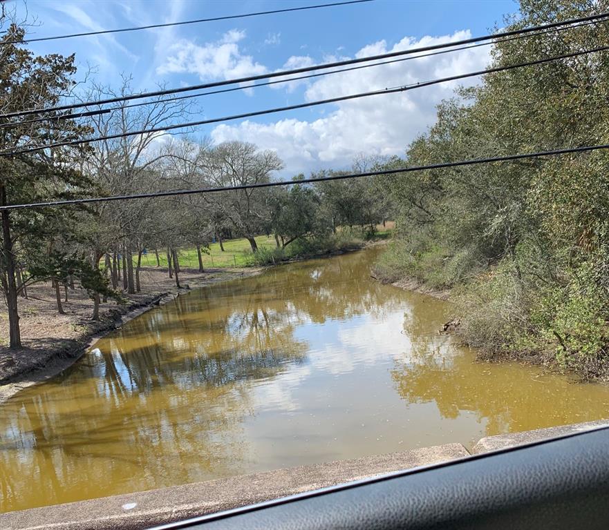 View of Highland Bayou from the road. Property on the right side.