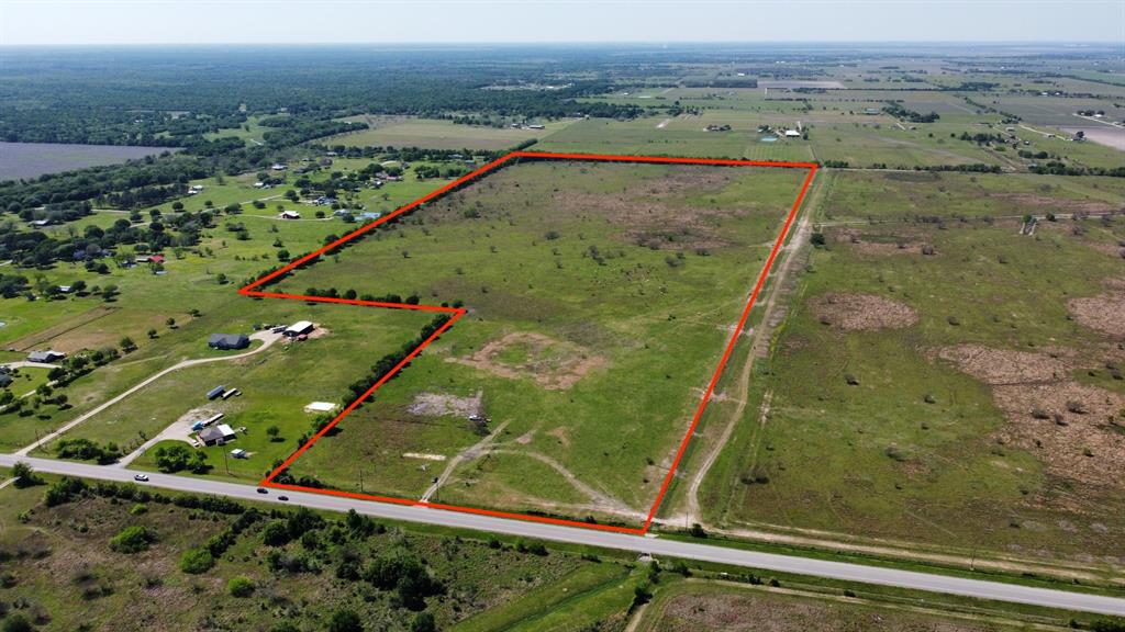 156+ Acre property located in Needville with frontage on FM 442 all zoned to Needville ISD.  This property has approximately 1375+/- ft of frontage with access to major freeways.  Currently in Agricultural exemption status and could remain as Ag land or purchase for an investment for future development for homes. There is mostly residential acreage properties with large land tracts surrounding it and additionally there is an acreage subdivision near this property that is currently in development.