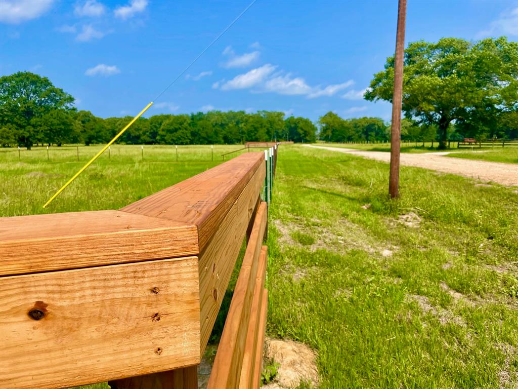 Looking for country acreage for your country homestead with an exceptional location?  This 3.25-acre tract of land outside of Bryan/College Station may be exactly where your vision becomes reality! Part of the Tabor Trace Estates subdivision, this land offers the tranquility of country living just outside of Edge, Texas, and comes with improvements to the land not common to find.  This acreage property comes complete with new net-wire perimeter field fencing along with a signature quality built equestrian four board entryway and gate with a culverted tie-in drive and 16-foot gate.  The terrain is predominantly level with scattered oaks among other species with just the right amount of open pastures to give the land an uncluttered and breezy homesite setting.  The land conveys with light restrictions in place to secure the enjoyment of your Texas country homestead for years to come.  Come and see the land that may be where the next great chapters in your story unfold!