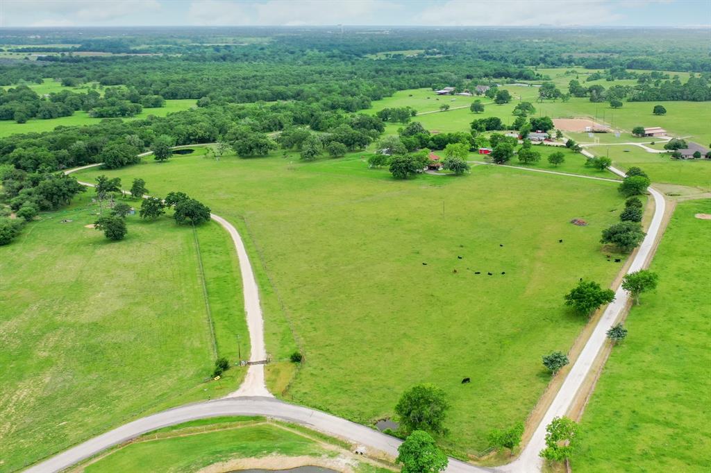 PERFECT HOMESITE WITH POND! 16.4+/- Picturesque Acres on the outskirts of Bryan, TX in Kurten! The perfect blank canvas to paint the picture of your dream home and country property. Located just half a mile off of HWY 190, this property is the perfect launchpad to your life in the Brazos Valley. Currently Ag Exempt, this property would be great for your 4-H/FFA Ranchette. With endless possibilities, no restrictions, and no part of the property in the flood plain, you may choose to build on the front of the property near Cliff Road or near the beautiful pond! Do not miss your chance at this rare find in Brazos County! This is selling out of a larger tract, buyer responsible for new survey. Need More Land? This 16.4 acres is out of a larger 27 +/- Acre tract with equipment shed, the additional 10.5 Acres and shed are not listed in MLS but could be sold for additional price. Call for Details.