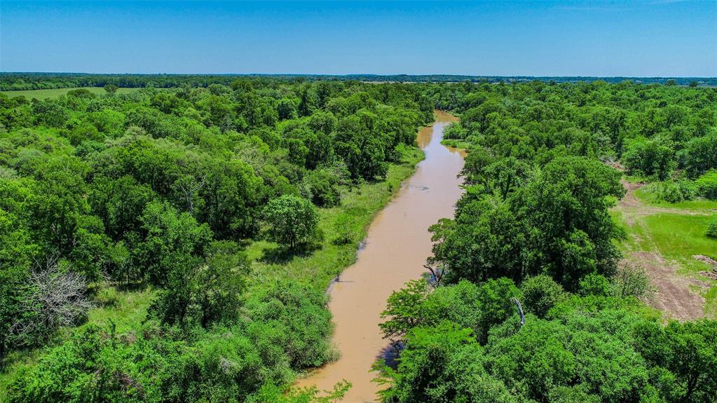 +/- 243 acres on The Old River in Burleson County! This recreational property is a true blank canvas with raw acreage for anyone looking to build a hunting cabin or permanent residence in a secluded portion of the county! Property features include: mature oaks & cypress, cleared trails throughout, perimeter clearing, cross & perimeter fencing, and Brazos River frontage. 50/50 woods/pasture mix makes for endless opportunities - Previous property use consisted of hunting retreat and cow/calf operation. Electricity and water on site at property. Do not miss out on this rare find in Burleson County!