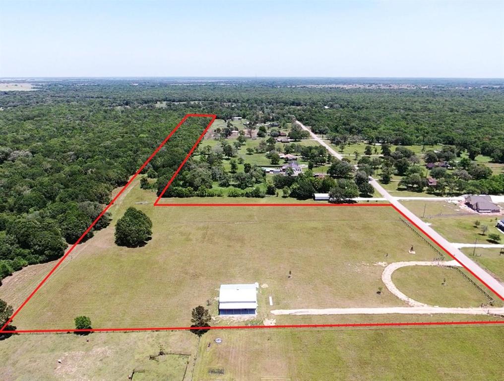 Location and Opportunity! Rare find of 12.87 acres hidden in West Columbia and ready for you to build your dream home! This gorgeous property has remained dry from flooding! Acreage includes a 40X50 shop with a 10' awning and one 10X10 roll up door! Shop is pre-plumbed for a bathroom as well! The gorgeous circle drive also has a double entrance already installed! This won't last long, come take a look today!