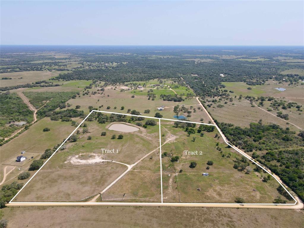 Lavaca County, very nice rectangular shaped 27.32 +/- acres in the Sweet Home area with Yellow Bank Creek running in the far southern boundary.  The large pond and creek lined with mature trees will make a great backdrop for a backyard view from your weekend home or permanent resident. Water well, electrical and entrance is in place with multi roads/ paths throughout the property. Property is located only 1/4 mile off of Paved CR 381.

Set up a feeder and game camera and watch what country living can share with you. The property is  fenced excluding the west boundary between tract 1 and 2. The fence is in good condition with fencing construction from 7 to 8 strands with  netting wire and pipe in some areas. Property holds an agriculture exemption and is presently being used for cattle.  An old pad site has a limestone base which could be repurposed.  There is a nice slope toward the southern end of the property. Tract 1 and 2 can be purchased together.