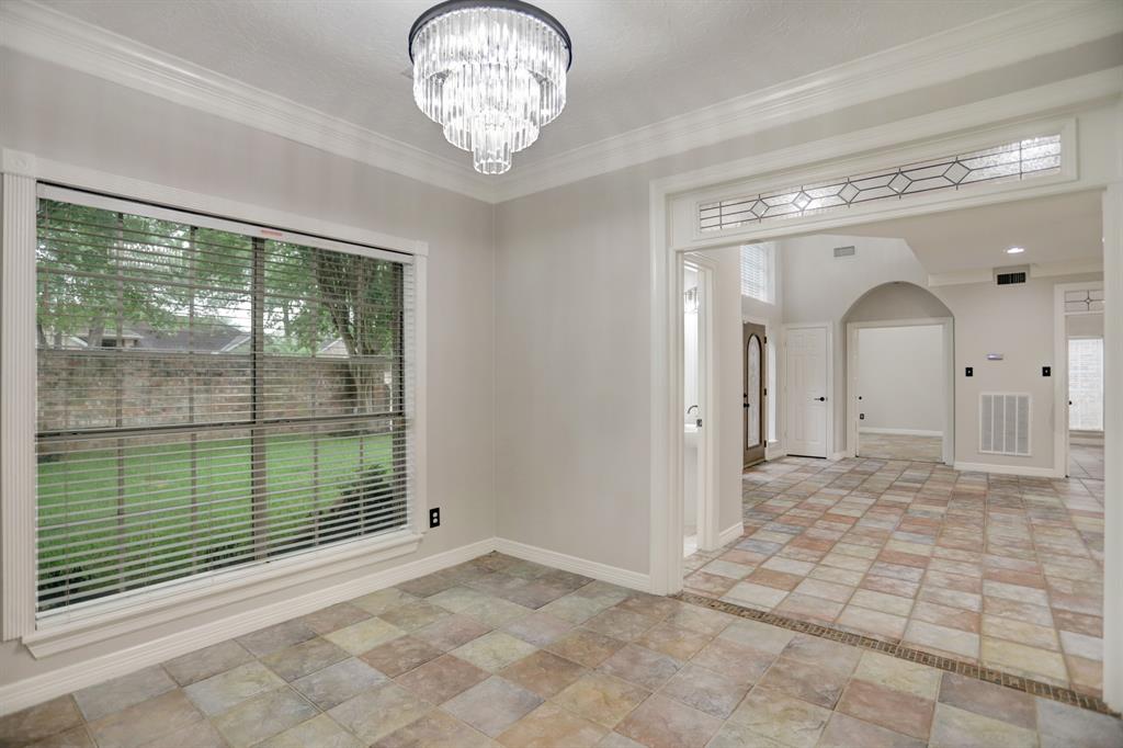 The dining room and a look outside to your private courtyard or into the den.