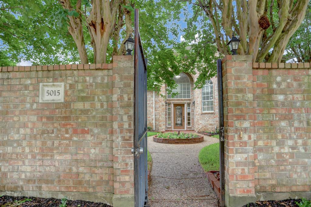Fenced or gated all the way around the house. A look from the street into your private courtyard and front door.
