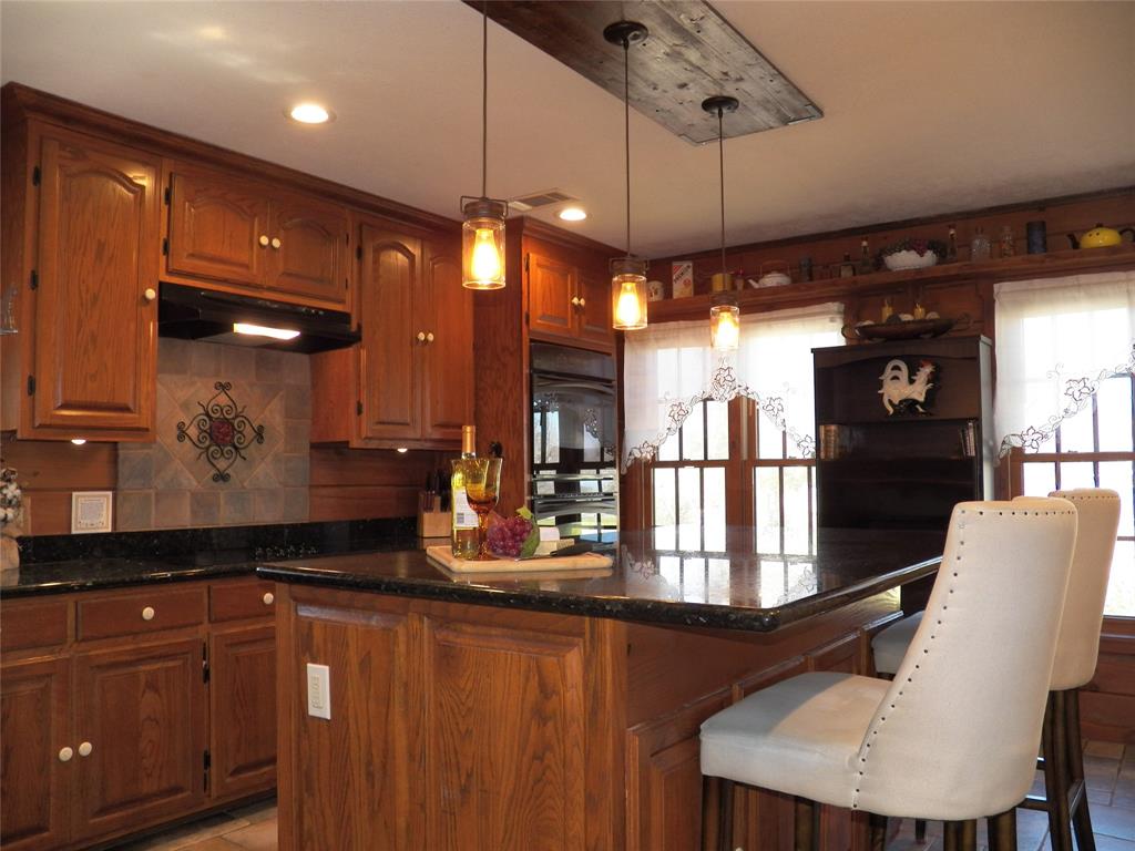 The Kitchen is always the Heart of the Home and this Kitchen is no different.  It is a great place to start your day and prepare the meals you and your family love the most.  The huge center island is perfect for seating 4 to 5 people.