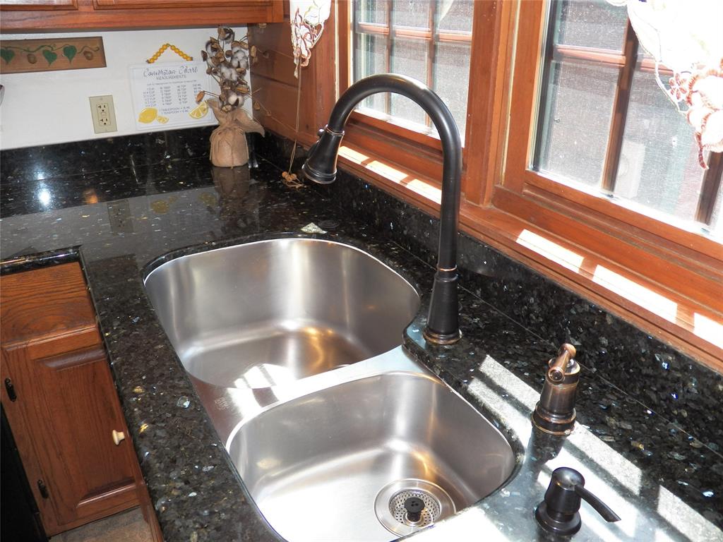 Oversized Stainless Steel sink for easy clean-up of larger cookware.