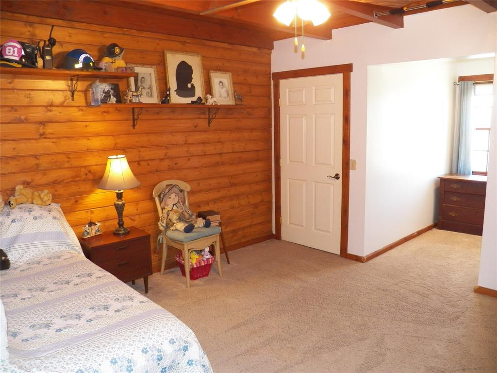 There are 2 front upstairs Bedrooms that have windows in the Dormer\'s - overlooking the Pond.  These 2 Bedrooms share a connecting Bath (Jack-n-Jill).  Both of these bedrooms have big closets.