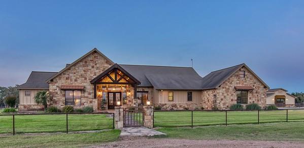 This stunning ranch style 4 bedroom/3.5 bath home is located on a desirable 16.930 Acres. Designed for entertaining & everyday living, the builder left no details to be desired. Complimented by designer fixtures, soaring ceilings, the living room is adorned by a gas stone fireplace w/ hand hewn mantle, lg windows provide natural light. Kitchen is every chef's dream-granite countertop, lg eat in bar, top of the line appliances, 48" commercial range with pot filler, dark maple-stained custom cabinets & lg walk in pantry. Spacious master suite w/ tray ceiling adds elegance to the room. Master bath-double vanity, jacuzzi tub, oversize stone walk-in shower w/ 2 walk-in closets. 3 additional bedrooms w lg. closets. Meander up the stairs & you will find an office/playroom. Outdoor-pool that has recently been replastered & retiled, outdoor kitchen/shower & a view to lose yourself in. An equestrian paradise- Horse barn-5 stalls w/ fan, tack rm, feed rm, tool shed, arena, trailer shed.