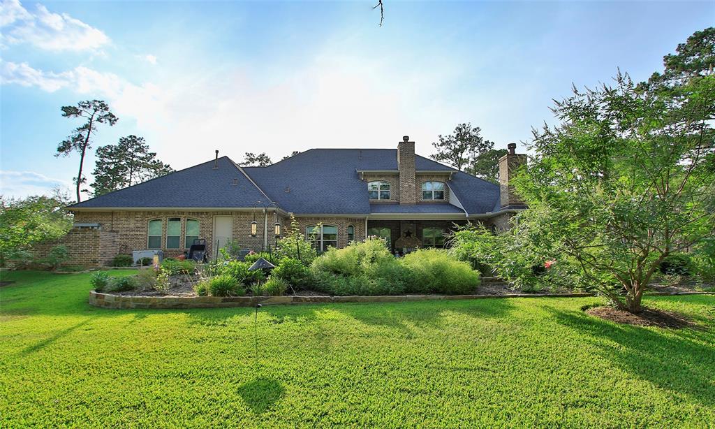 Plenty of area behind the pool. The landscaping provides you plenty of privacy to your pool.