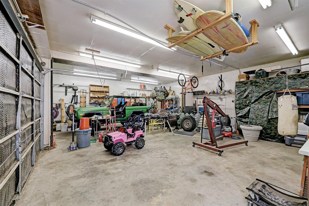 Workshop dream! Air-conditioned three car garage, 1040 sq ft.