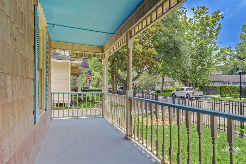 Spacious, classic front porch overlooking picturesque street with established homes.
