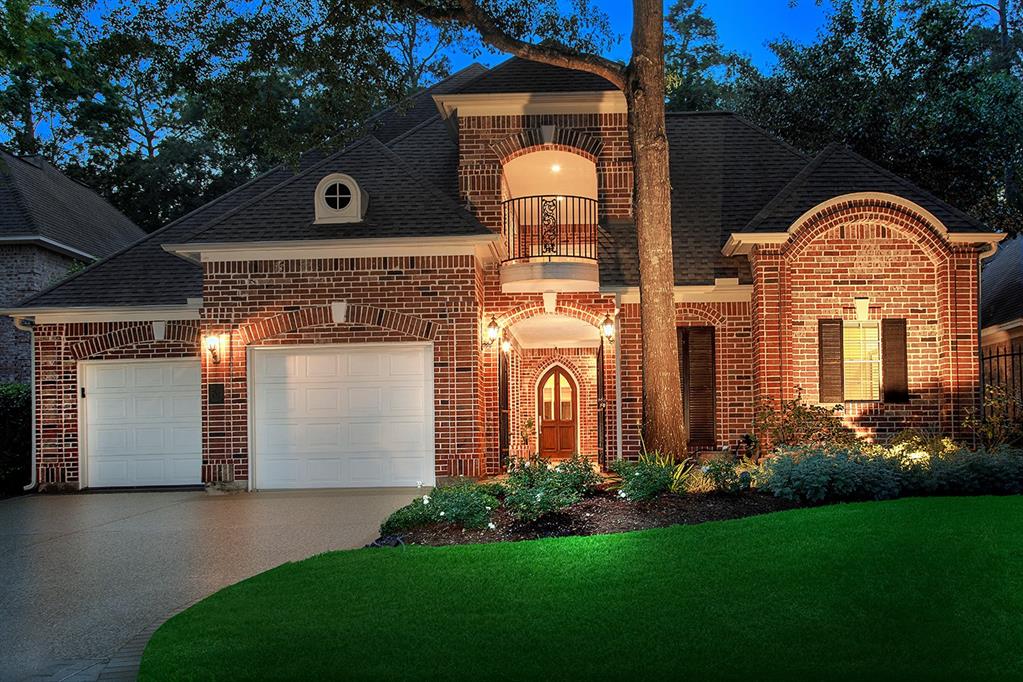 Custom leisure home overlooking the 2nd hole of the Tournament Player's Course in Grogan's Mill! Walking distance to Market Street, Woodlands Waterway, concerts at the Pavilion and easy access to I-45 and Grand Pkwy for that commute! Some of this home's highlights include hardwood flooring (no carpet!), amazing storage, detailed trim work, plantation shutters, new A/C units and walls of windows that provide natural light and serene golf course and pond views throughout. The courtyard entry with fountain leads to a casita with full bath and walk-in closet; a formal dining room with doors leading to the courtyard offers an al fresco dining experience, and the adjacent wine grotto is convenient for entertaining. The two story den flows into the breakfast room and island kitchen; owner's retreat down; reading nook, study with built-ins, wraparound balcony and two bedrooms with en-suite baths up; enjoy serene golf course views from your covered patio!