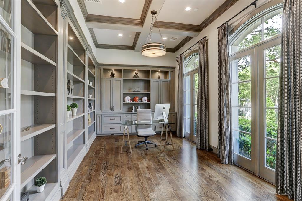 Gorgeous office looking out onto Memorial Drive with lots of built-ins