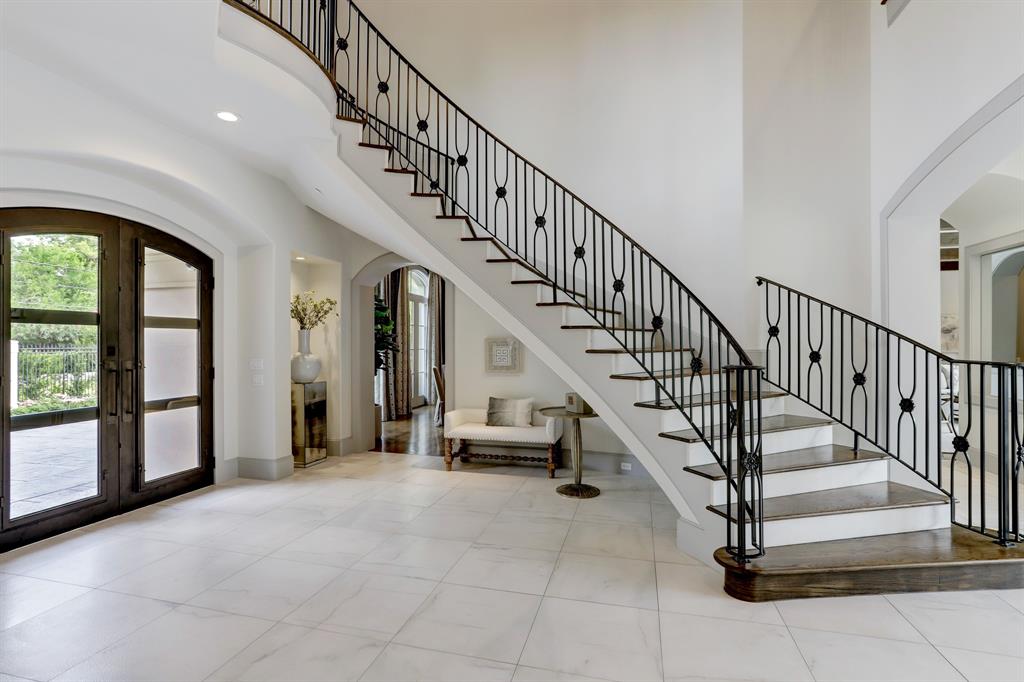 Marble Entry with views of the dining room and office